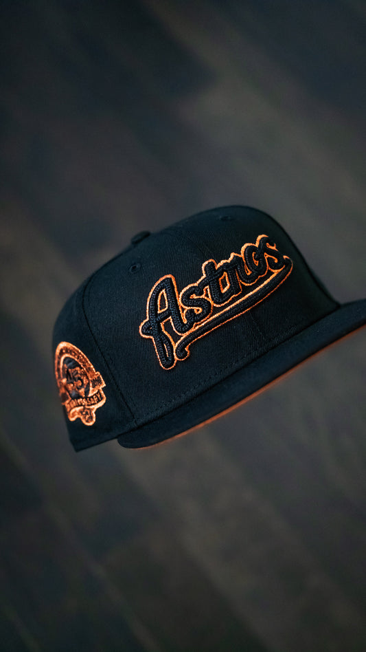 Black and burned orange Astros Script